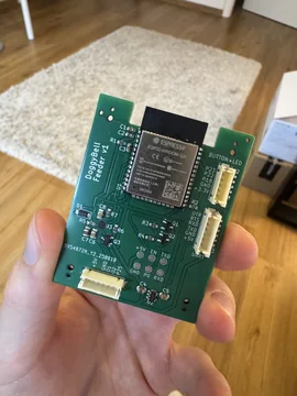 DoggyBell feeder circuit board with a wireless module, connectors and control electronics.
